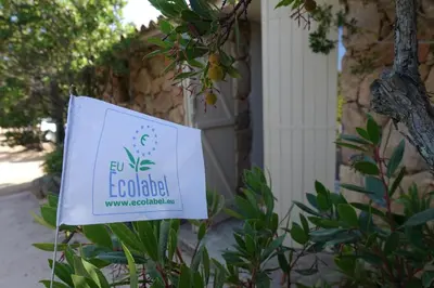 a sign for a garden outside a house at Domaine de la Punta in Porto-Vecchio