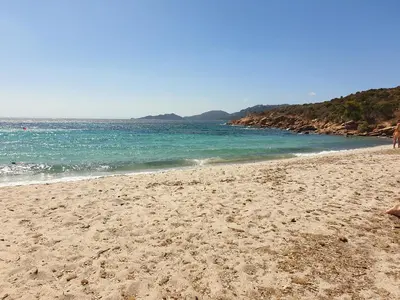 a sandy beach with the ocean in the background at Domaine de la Punta in Porto-Vecchio