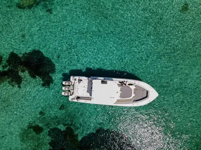 an aerial view of a boat in the ocean at U Capu Biancu in Bonifacio