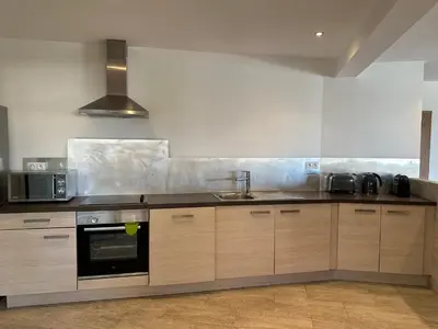 a kitchen with a sink and a stove at Residence Casa Di Paoli in Porto-Vecchio
