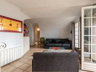 a living room with a couch and a table at Apartment Casa Marcelli by Interhome in SantʼAntonino