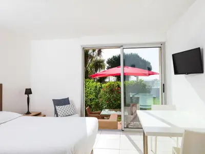 a kitchen with a sink and a refrigerator at Apartment MB2 sans vue mer by Interhome in Moriani Plage