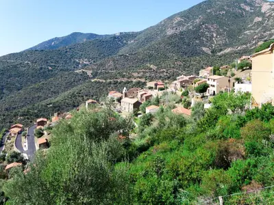 a village on the side of a mountain at Apartment Camelia- Marjolène by Interhome in Partinello