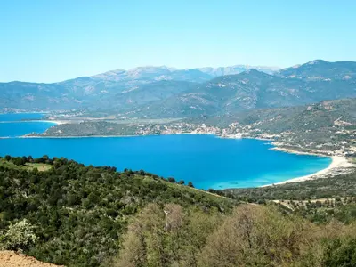 a view of crater lake from the top of a mountain at Holiday Home La Pinède- bungalow 6 pers- by Interhome in Sagone