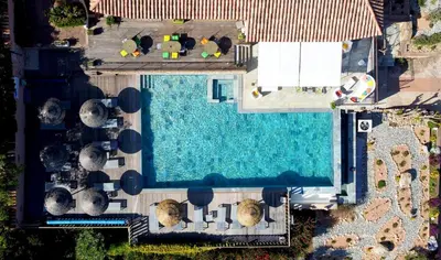 an overhead view of a swimming pool in a resort at Résidence U Pirellu in Porto-Vecchio