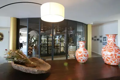 two vases sitting on a table in a store at Hôtel Restaurant Dolce Vita in Ajaccio