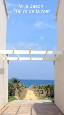 a view of the beach from a villa jason im die la at Jason in Cervione