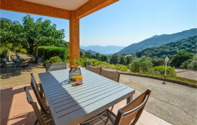 a blue table and chairs on a patio with a view at Nice Home In Casalabriva With Wifi in Casalabriva