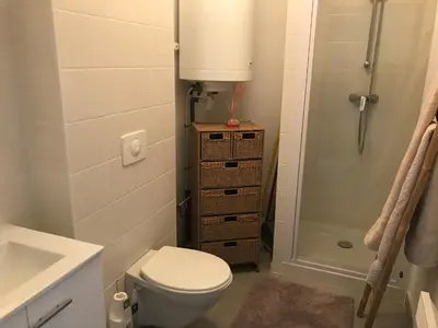 a bathroom with a toilet and a sink and a shower at Panate in Corte