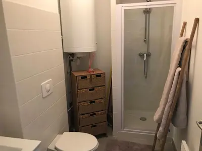 a bathroom with a shower and a toilet and a sink at Panate in Corte