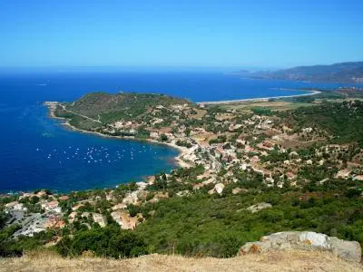 an aerial view of a small island in the ocean at Residence Sejoina in Calcatoggio