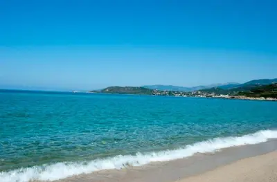a view of a beach with the ocean at Residence Sejoina in Calcatoggio