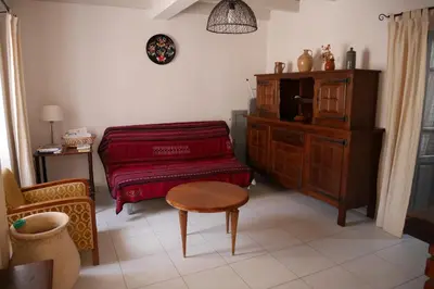 a living room with a couch and a table at A Cittadella in Vico