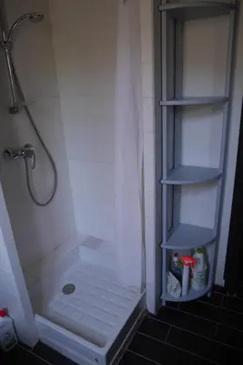 a bathroom with a shower stall with a shower at A Cittadella in Vico