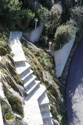 a set of stone steps on the side of a hill at Casa Di Lucia Mi-Hotel in Mazzola