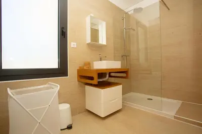 a bathroom with a sink and a shower at Cantari in Calenzana