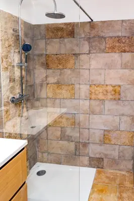 a bathroom with a shower with a glass door at Apartment A Suara di Mare by Interhome in Ghisonaccia