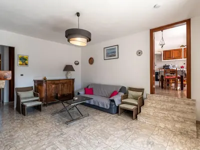 a living room with a couch and chairs and a table at Apartment Casa Antoinette by Interhome in Prunelli-di-Fiumorbo