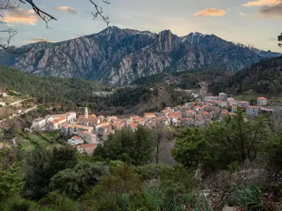 a view of a town in the mountains at Holiday Home Migone de Sampolo by Interhome in Ghisoni