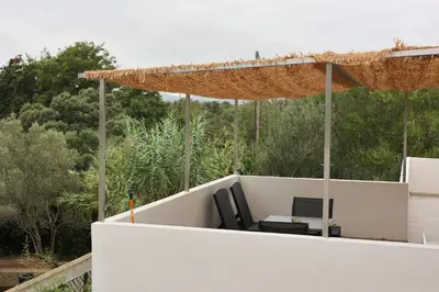 an office on the roof of a house at Marina Di Fautea in Olmucciu