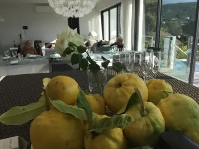 a table with a bunch of yellow fruit on it at Casaluce in Casaglione