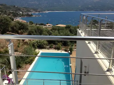 a view from the balcony of a house with a swimming pool at Casaluce in Casaglione