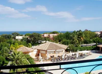 a view of a resort with a swimming pool at Vacancéole - Résidence Sognu di Mare in Linguizzetta