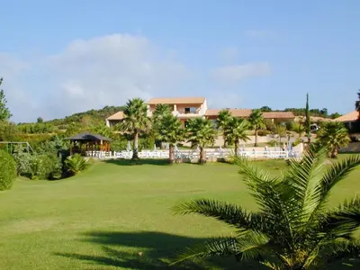 a view of the resort from the garden at Résidence Odalys Stella di l'Aria in Tizzano