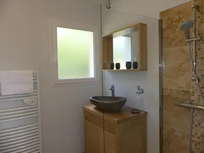 a bathroom with a sink and a shower at Maison d' Hôtes L'Aria Mezzana in Sainte-Lucie de Porto-Vecchio