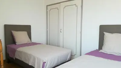 two beds sitting next to each other in a bedroom at Rinasce In Corsica in Poggio-di-Venaco