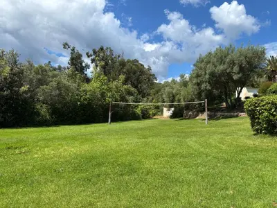 a soccer field with a net in a field at Cardellini 4 in Sari Solenzara