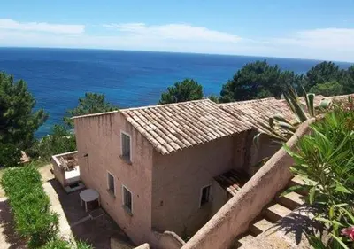 a building with a view of the ocean at Asphodele in Tarcu