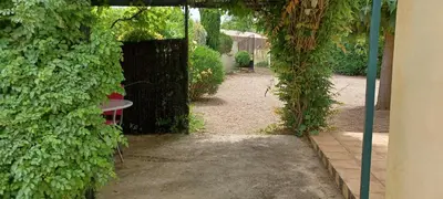 a dirt road with trees and mountains in the background at Carestella in Porto-Vecchio