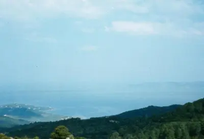 a view of the ocean from the top of a mountain at A Luna Rossa in Coti-Chiavari
