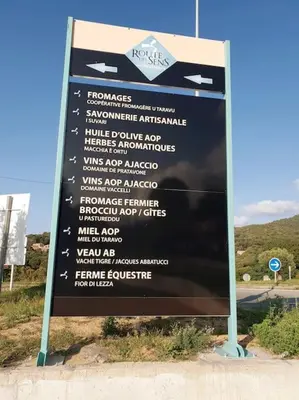 a sign on the side of a road at Beau F4 petreto-Bicchisano in Petreto-Bicchisano