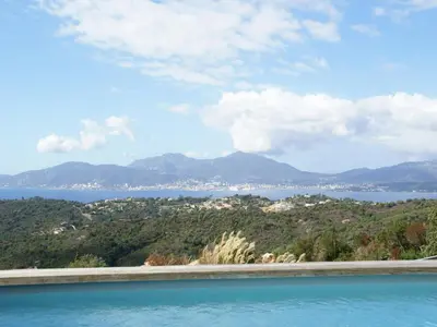 a view of the water with mountains in the background at Sunset Villa with Bay View in Molini