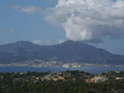 a view of a city and a body of water at Sunset Villa with Bay View in Molini