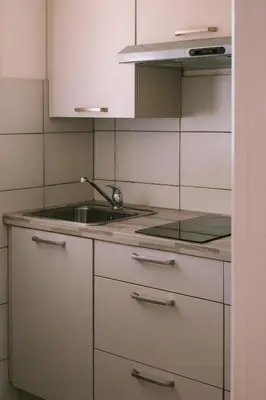a kitchen with a sink and a counter top at Creste E Mare in Ajaccio