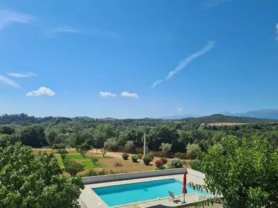 an aerial view of a villa with a swimming pool at E Cabane in Rottani
