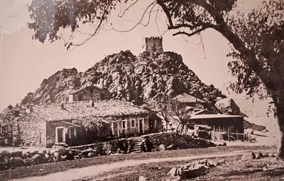 an old photo of a house on a mountain at Brise de Mer in Porto Ota