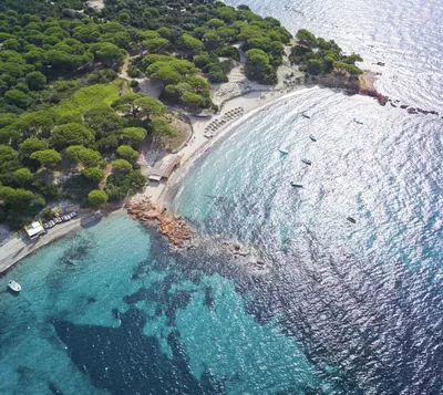an aerial view of a beach with boats in the water at U Cantu di i Cardellini in Porto-Vecchio