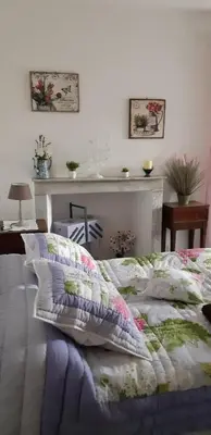 a bedroom with a bed with pillows on it at Casa san salvadore in Favalello