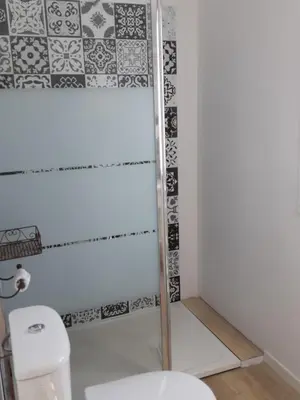 a bathroom with a toilet and a shower at Casa san salvadore in Favalello