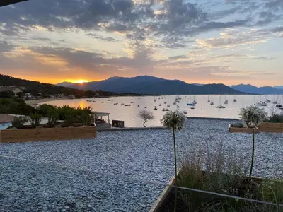 a view of a lake with boats in the water at Residence Capriona in Porto Pollo
