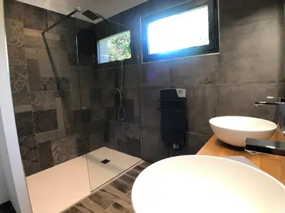 a bathroom with a shower and a sink at Residence Capriona in Porto Pollo