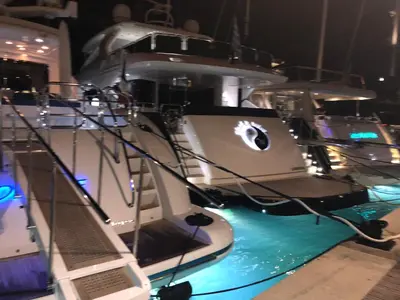 a boat in a room with a stage at Bonifacio 5 minutes du port et plage - clim & piscine in Bonifacio