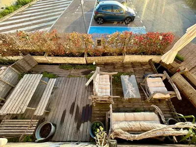 an aerial view of a car parked on a street at Magnifique appartement devant la plage in Propriano