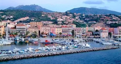 a harbor filled with lots of boats in the water at Magnifique appartement devant la plage in Propriano