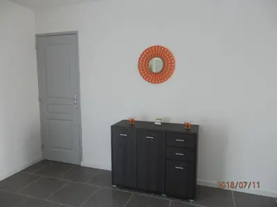 a room with a dresser and a mirror on the wall at corse location in Linguizzetta