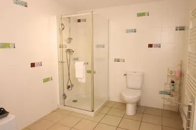 a bathroom with a shower and a toilet at Villa Ghiatone in Pietrosella